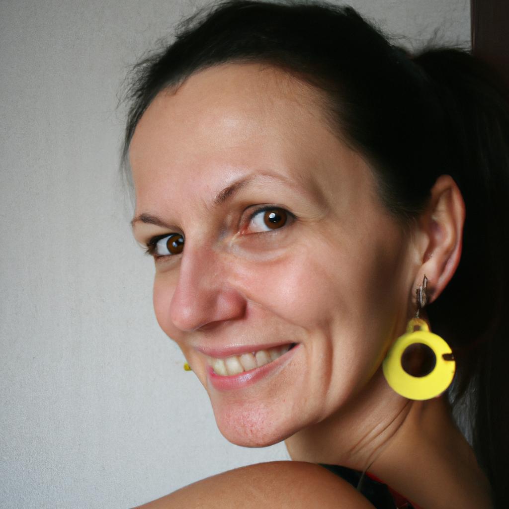 Woman wearing hoop earrings, smiling